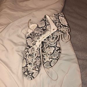 White and black snake skins high hells lace up